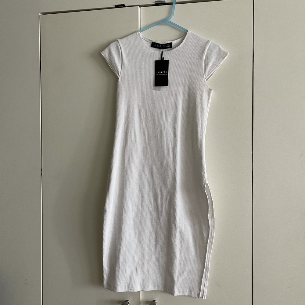 BNWT lioness ribbed midi dress with side slit
